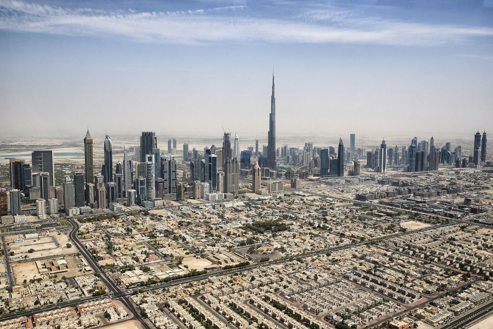 Aerial view of the Dubai skyline with Burj Khalifa and the Sheikh Zayed Road towers